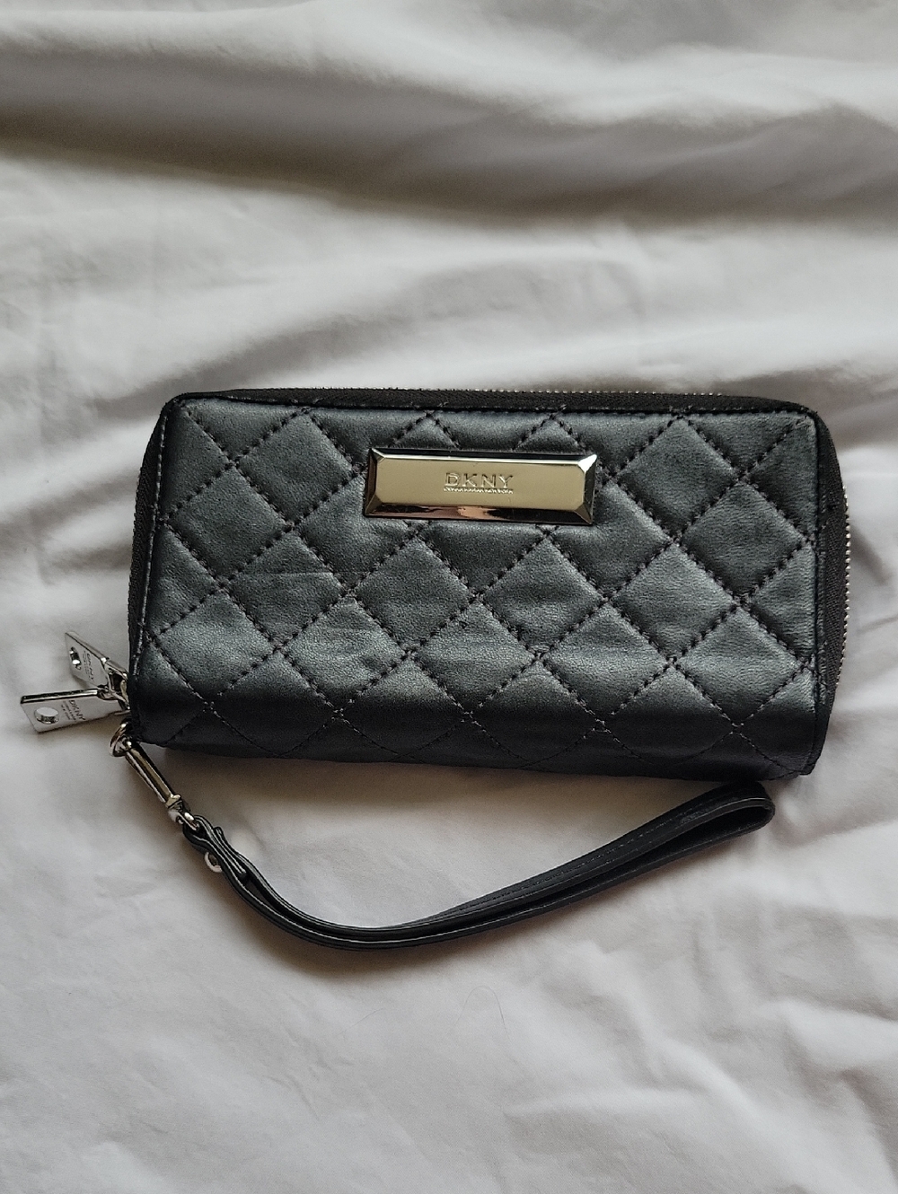 DKNY Black Quilted Wristlet Wallet with Polished Plaque - flaw see description